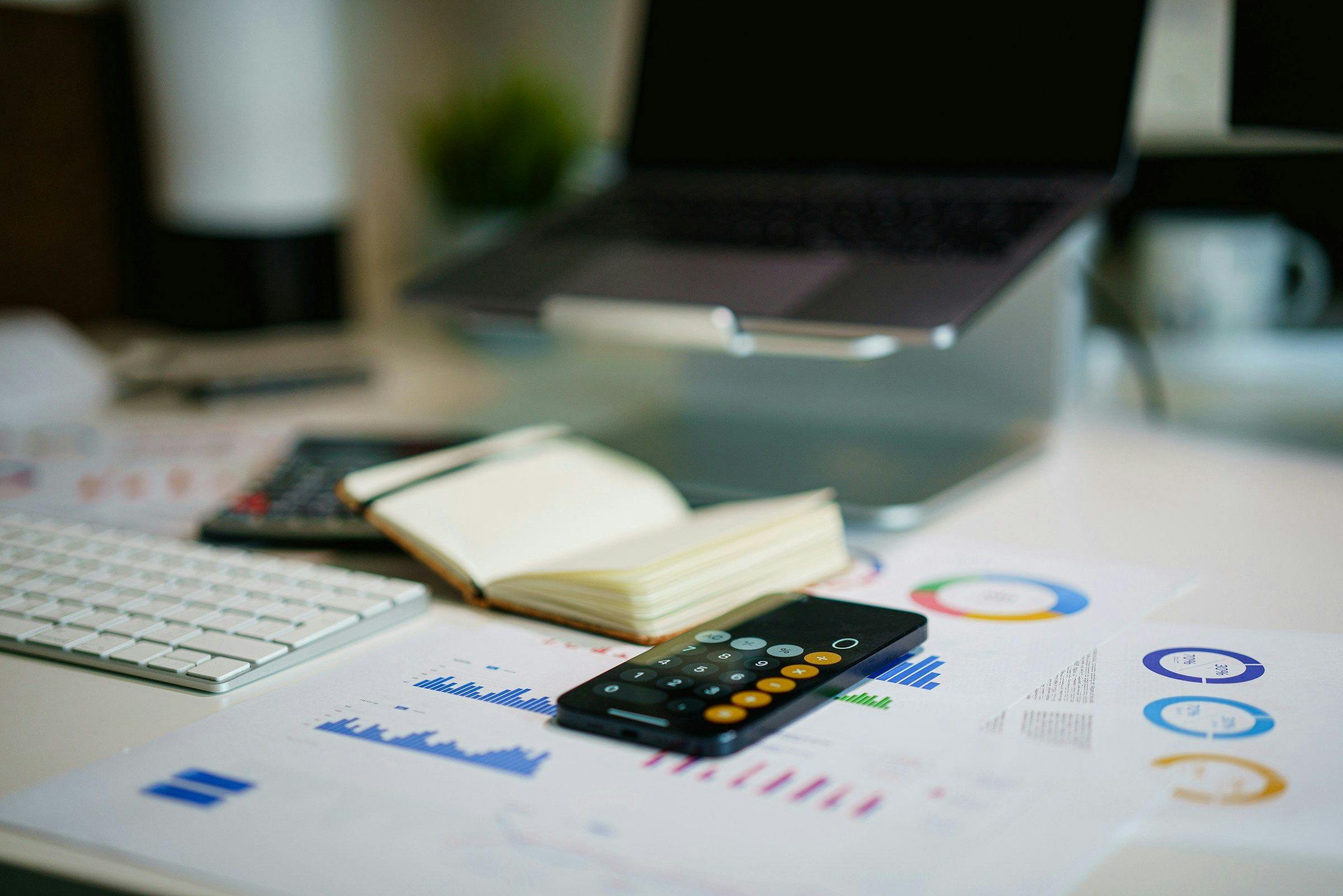 Calculator and books on table